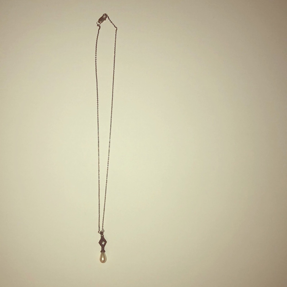 Antique pearl and precious stone necklace.